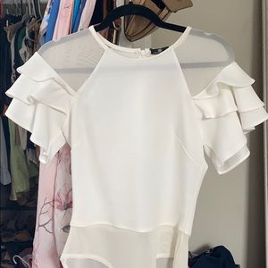 Ruffle sleeve body suit